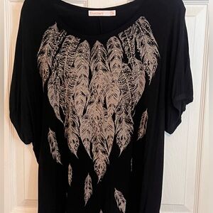 Cute black top with sequin covered feathers